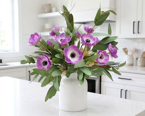 Real Touch Anemone Poppy Stems in a white ceramic vase in a modern white kitchen
